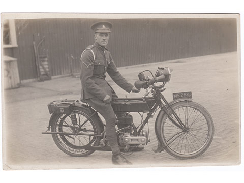 Royal Artillery coporal on Triumph Motorbike postcard